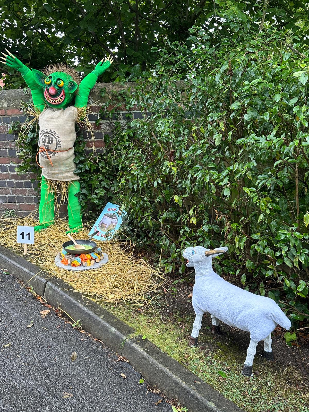Scarecrow with goat